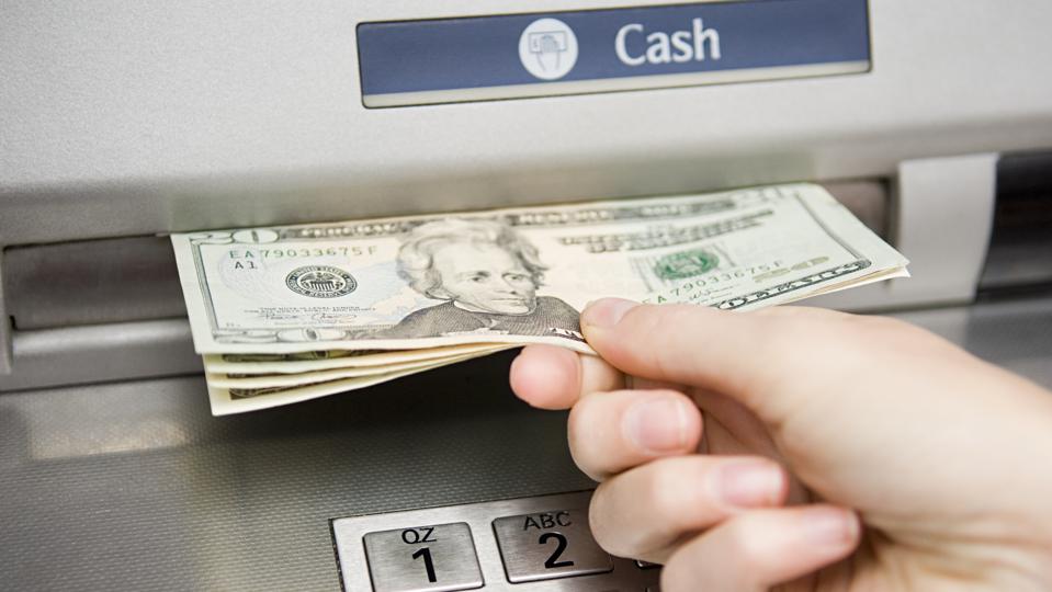 How Much Money Does an ATM Machine Hold & How to Withdraw It